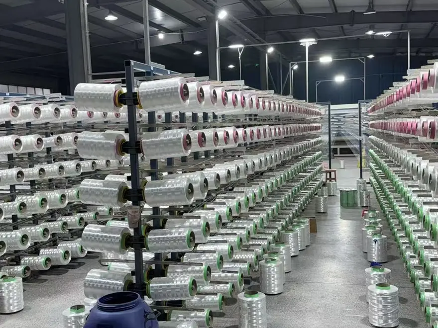 UHMWPE yarn packages on the creel